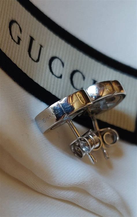 orecchini con logo gucci in argento